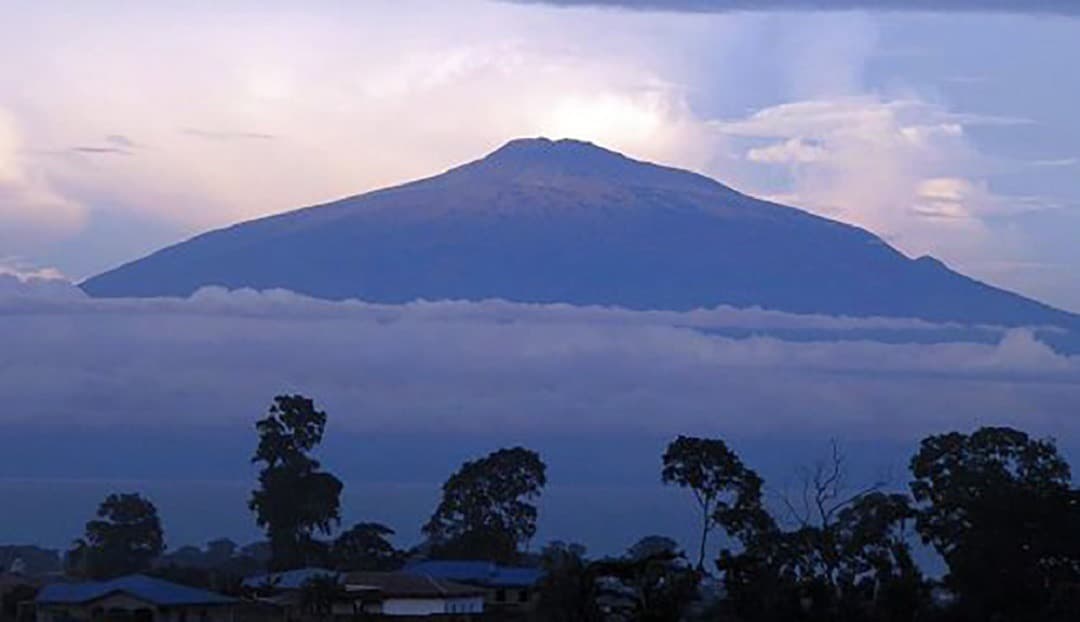Mount Cameroon rising above the clouds over Buea